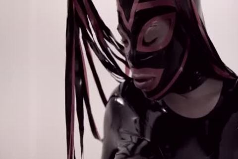 tranny In Latex Bodysuit